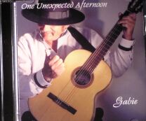 St. Louis Dinner Guitarist Gabie McGarrah Plays Ballads, Jazz, Classical And Flamenco Pieces.
Gabie performs as a Dinner Guitarist, a Strolling Guitarist, and also as a combination One-man Band/D.J.