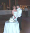 2-eric_al_cuttingwedcake-r.jpg (21723 bytes)