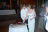 3-ericallisoncuttinggroomscake.jpg (19975 bytes)