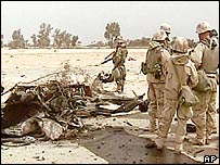 Coalition soldiers at site of car bombing in Najaf