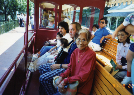 Inay riding the tram at Disneyland
