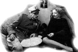 Con Marlene Dietrich en una escena de Marruecos