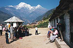 Click to enlarge - school in Tatapani. View of Annapurna South.