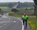 [ Gary cycling up a hill ]