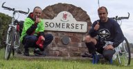 [ Gary and Roberto by a road-sign for Somerset ]
