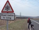 [ An unusual hill-top road-sign ]