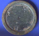 English brass-copper Weight. This is a bronze weight of the reign of George III, or possibly the earlier part of the reign of George IV. 
Note the relative positions of the marks the dagger the ewer, and the royal cipher.