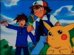 Pikachu looks slightly confused.  Ash and Gary look ready to battle.