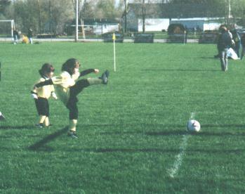 Justine playing soccer 2002