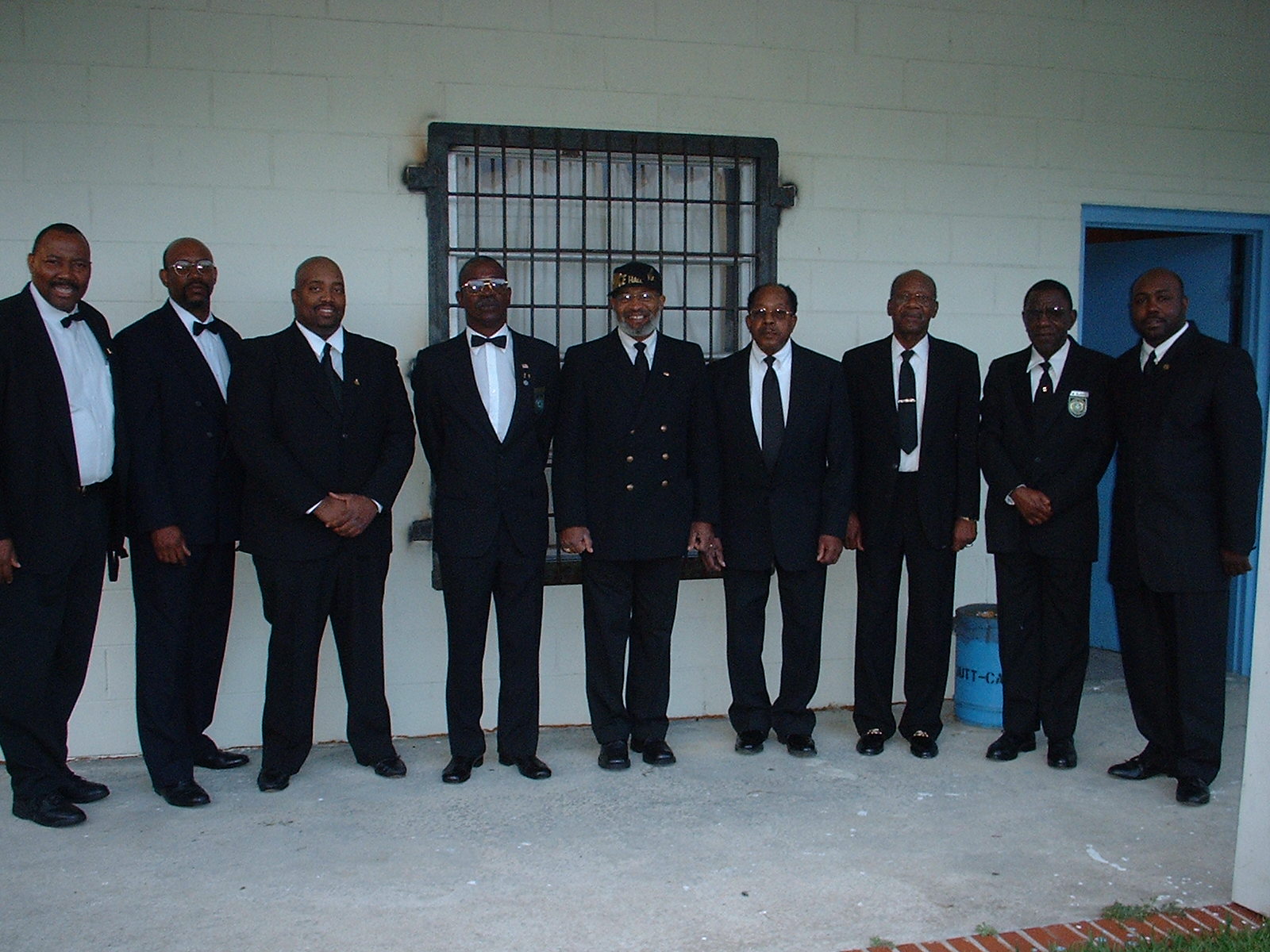 brothers outside the lodge