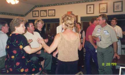 Jeanne leads the 69er choir... "Glenwood High School, Glenwood..."