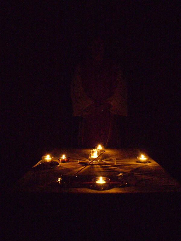 P2210037.JPG - The ritual area is totally different by candle light. Ruiseart is barely visible in the background