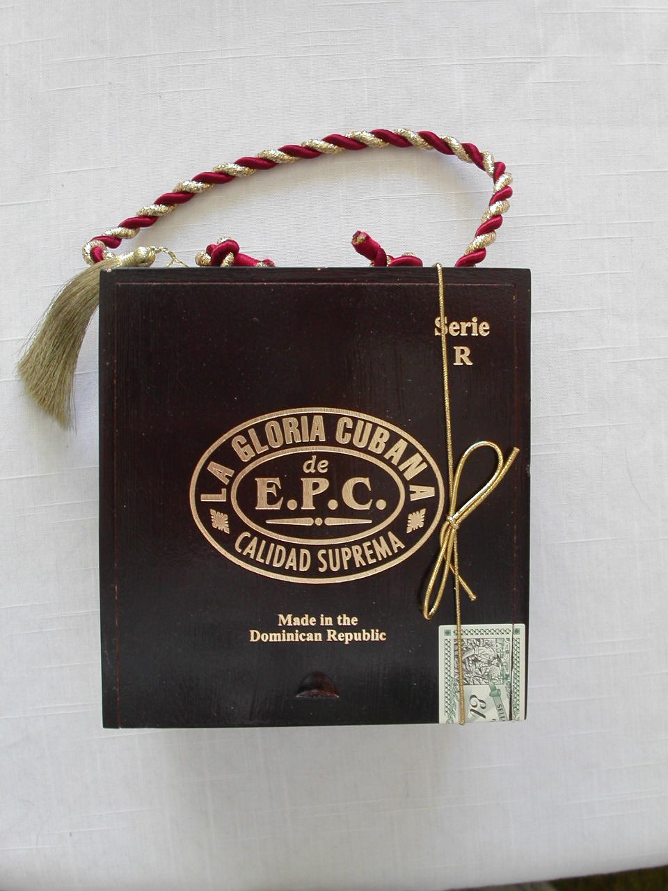 Red and gold cord handle