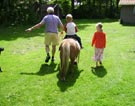 Jeroen, Marrit and their grandpa Aart in Zeeland, July 2005