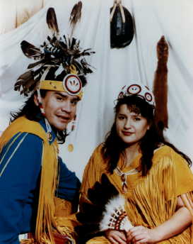 Native Americans wearing traditional clothing
