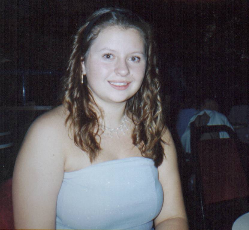 Me with curly hair semi-drunk at Cayton Bay!!!