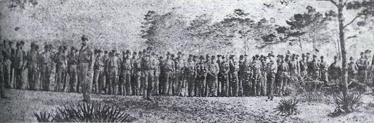 The New Orleans Cadets, and their leader Captain Dreux; photograph by J.D. Edwards, in Pensacola, Florida. From The Civil War: Fort Sumter to Gettysburg, William C. Davis & Bell I. Wiley, Black Dog & Leventhal Publishers, NY, 1998. p. 363 (Louisiana Historical Association Collection).