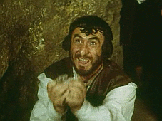 Krämaren herr Bonacieux får en påse pengar av kardinalen i filmen »D'Artagnan och de tre musketörerna« (Sovjetunionen 1978)