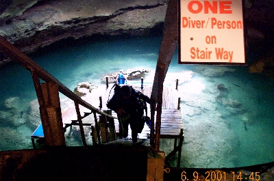 Narrow stairway from top level to landing