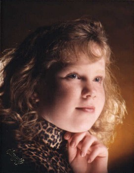She HATES this picture, but I think she looks cherubic. It's from about eight years ago