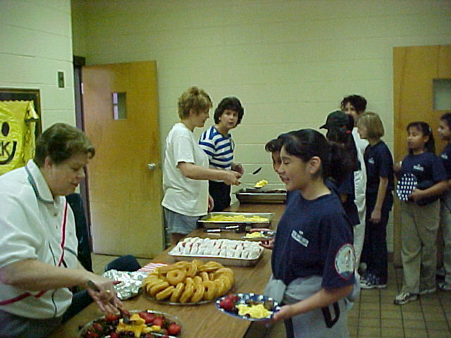 Parents work to feed hungry Space Teamers.