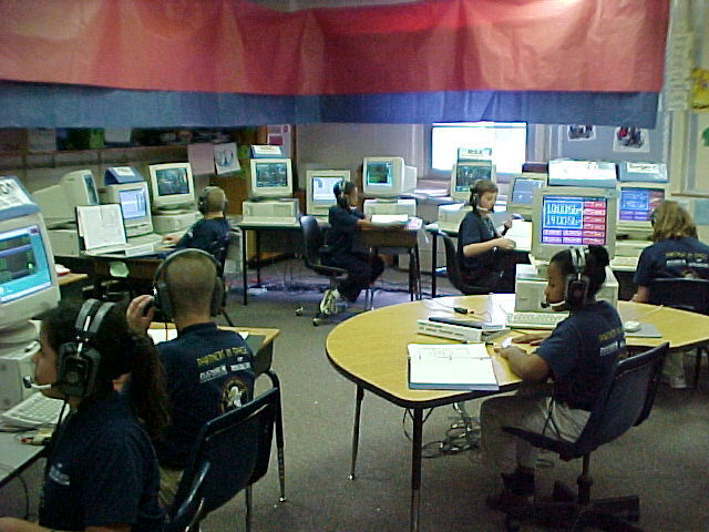 The STS-3 Mission Control team monitors a situation.