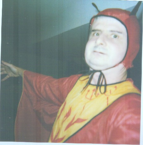 Side view of devil me with spreaded arms