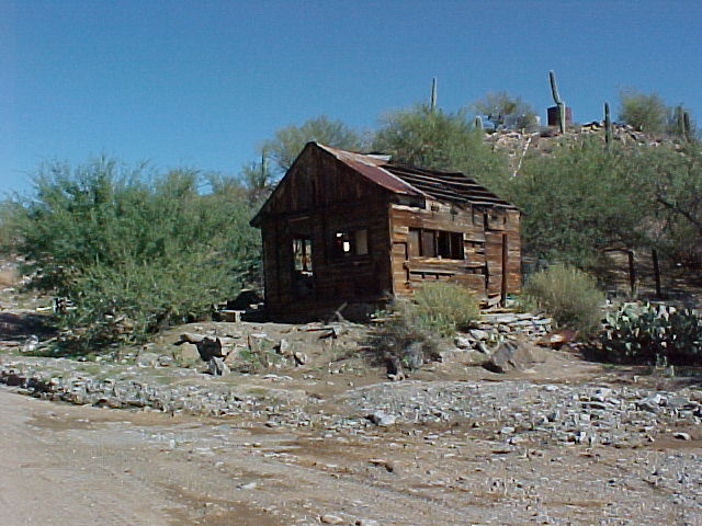 an old cabin near the ranch house