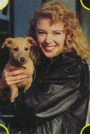 Kylie & Dog picture (80's) ...from kylie.co.uk/gallery...