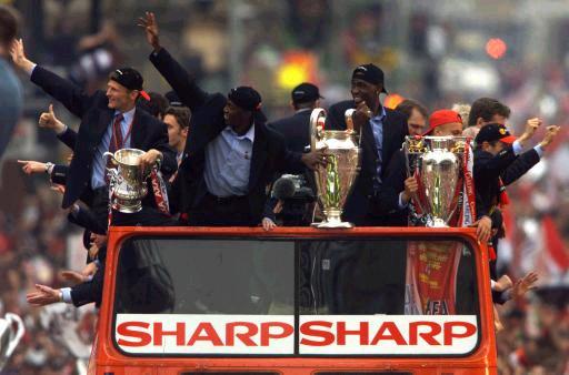 Manchester United on their victory parade, after winning the treble