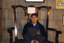 Midget in big chair