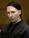 Manson stands in quiet awe