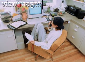 At the computer looking for threads on her favorite subject