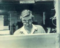 photo of Giorgio Santelli w/reading glasses in 1960's