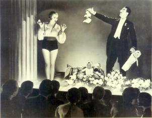 photo of Giorgio Santelli doing magic on stage in New York
