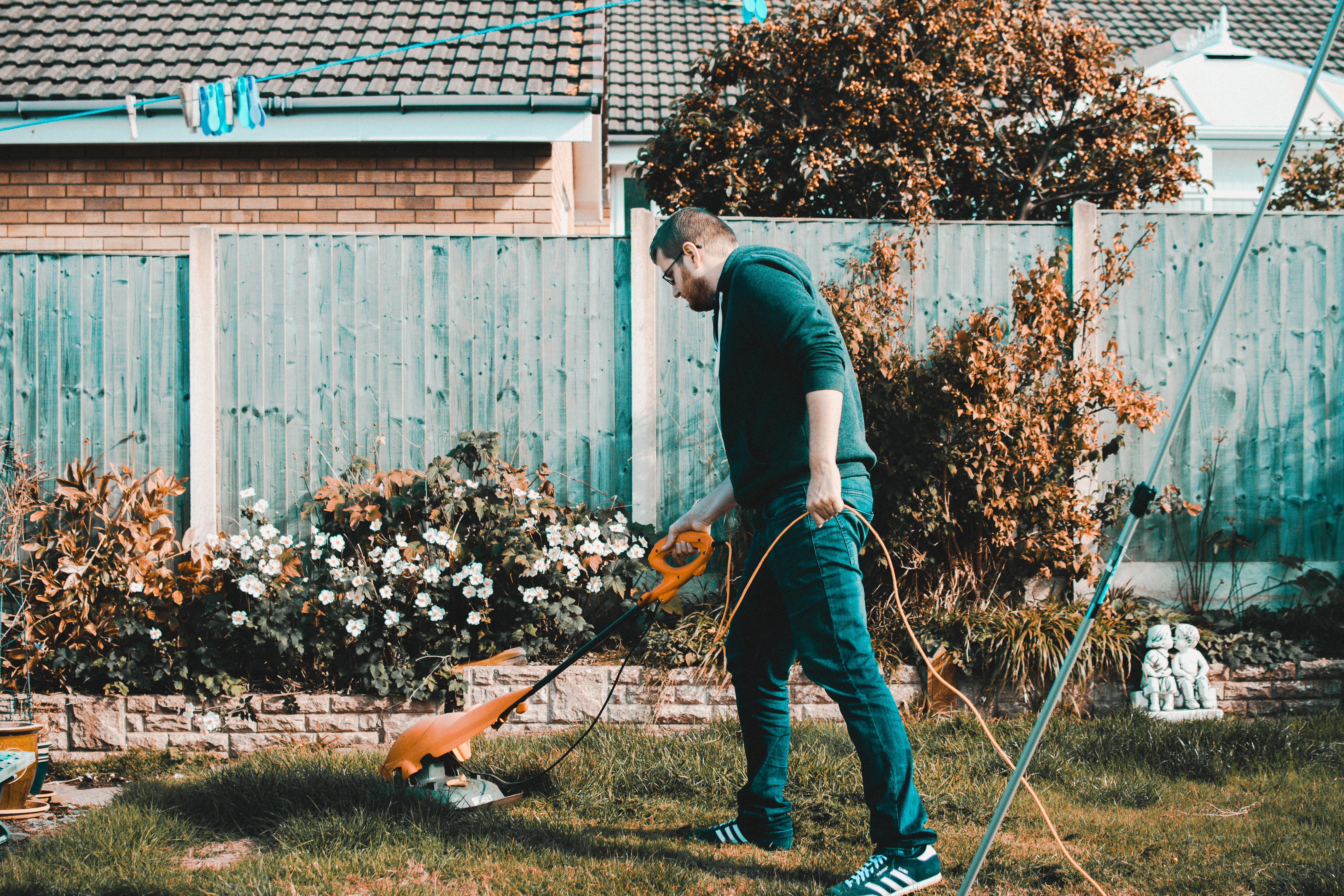 Adult With Weed Eater