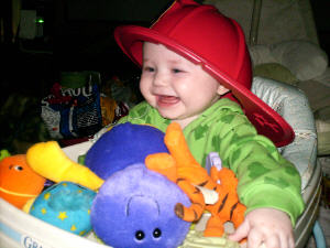 Monika in Jeffery's fireman's hat