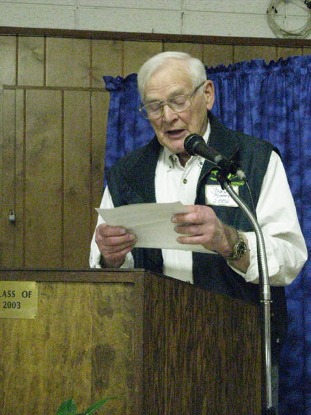 Frank Moore reads the presentation speech