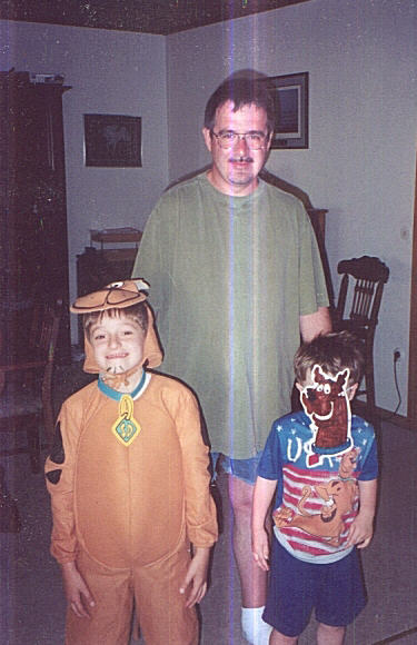 Zach, Jared, and the big guy is my Uncle Mark, getting ready to party hardy on Halloween.