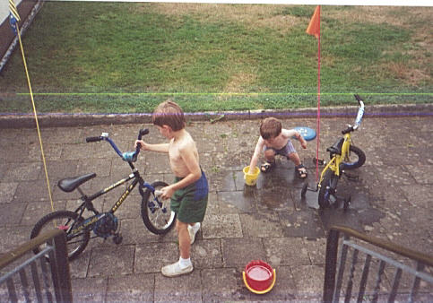 My cousins washing their bikes.&nbsp; Zach and Jared are the cousins we never met.