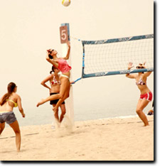 Lauren hitting during a beach volleyball tournament over Memorial Day weekend.