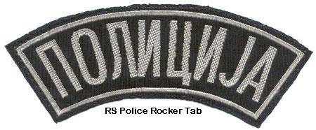 RS POLICE ROCKER TAB: Worn over RS Coat of Arms see below