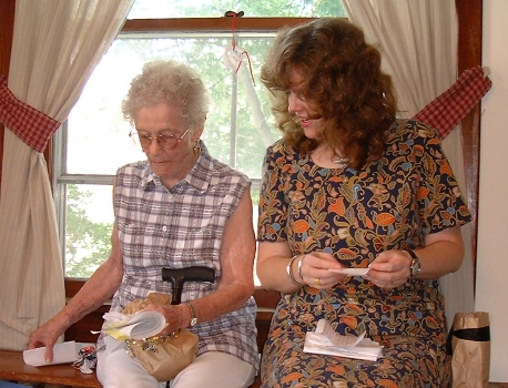 Gma & Karen opening gifts?