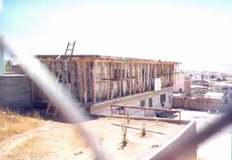 The roof had to be formed and supported with lumber.