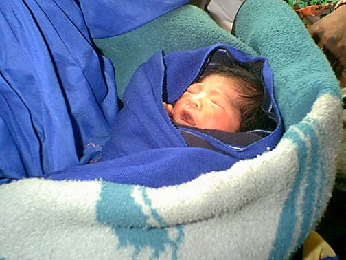 Born a month early, the baby only weighed about 5lbs. 
