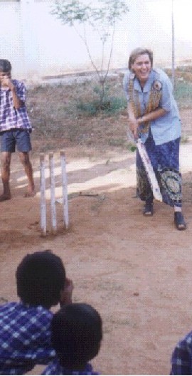 Merieke playing cricket with our boys. Cricket is very popular game in India