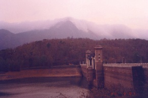  Parambikulam Dam.. Highest Peak of the Sanctuary in the Background.. KarimalaGopuram(1440m)- It's a challenge for Trekkers to reach the Peak