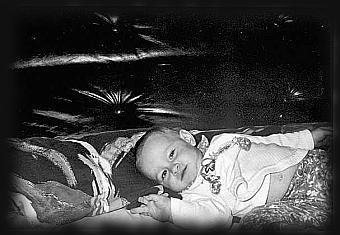 Baby in Daddy's bed