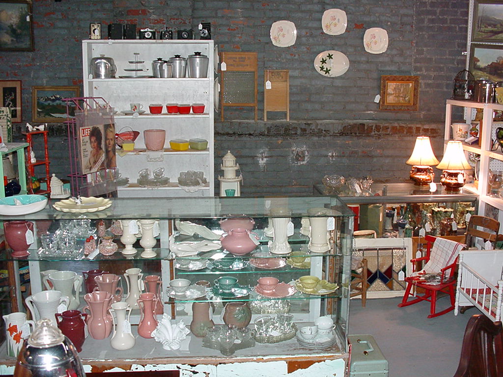 Booth 26, James and Carlette Landrum and Becky Tuggle:  Fine Collectibles, Pottery, Glassware and much more!