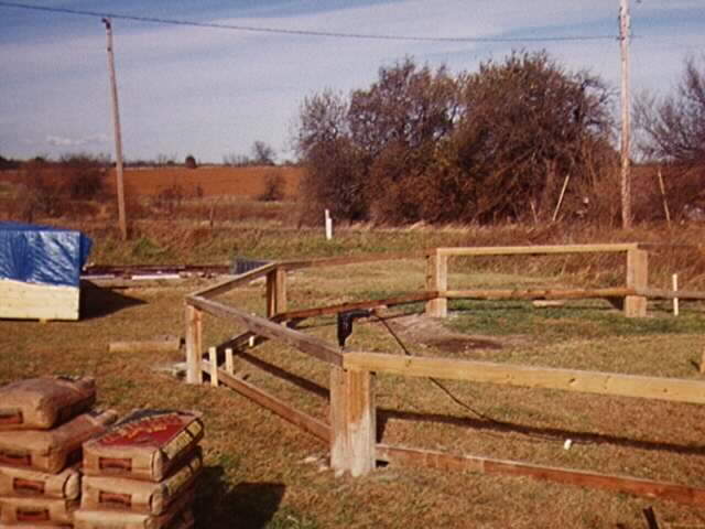 base support beam being anchored in place